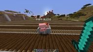 A pig with a saddle in a Minecart (Image via u/fxceless725 on Reddit)